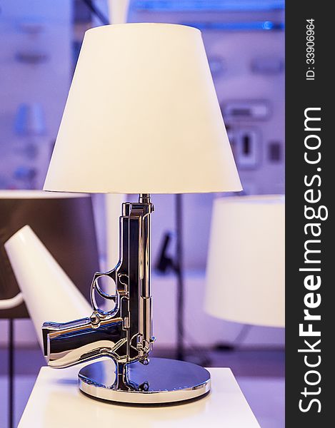 Table lamp with form of automatic weapon. Table lamp with form of automatic weapon