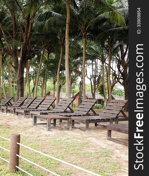 Lounge chair in the garden at resort. Lounge chair in the garden at resort.