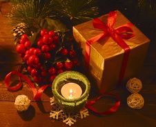 Golden Box With Ilex And Candle Royalty Free Stock Image Golden Box With Ilex And Candle Royalty Free Stock Image