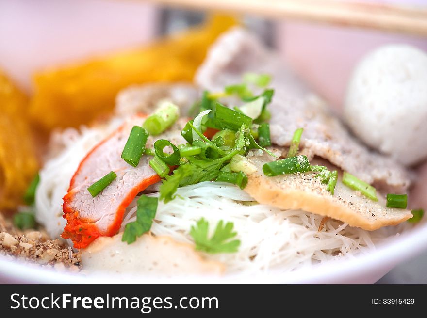 Bowl of traditional Chinese red pork noodles no soup