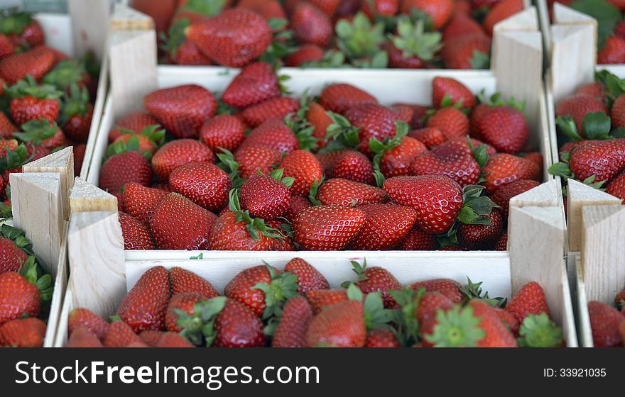 Strawberries in a box on the counter