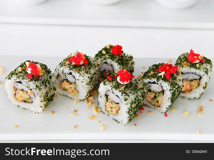 Colorful sushi on the plate in restaurant. Colorful sushi on the plate in restaurant