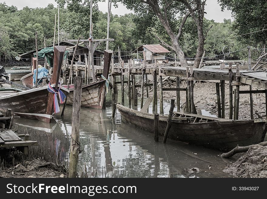 Environment around mangrove forest with wooden boats