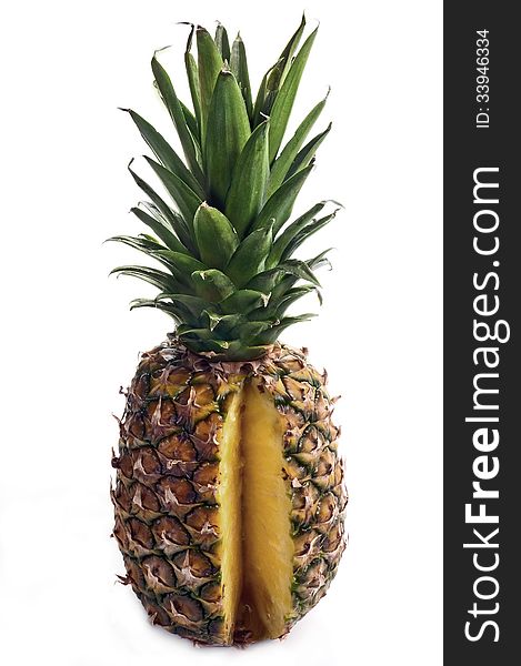 Large ripe pineapple with the clipping isolated on white. Large ripe pineapple with the clipping isolated on white