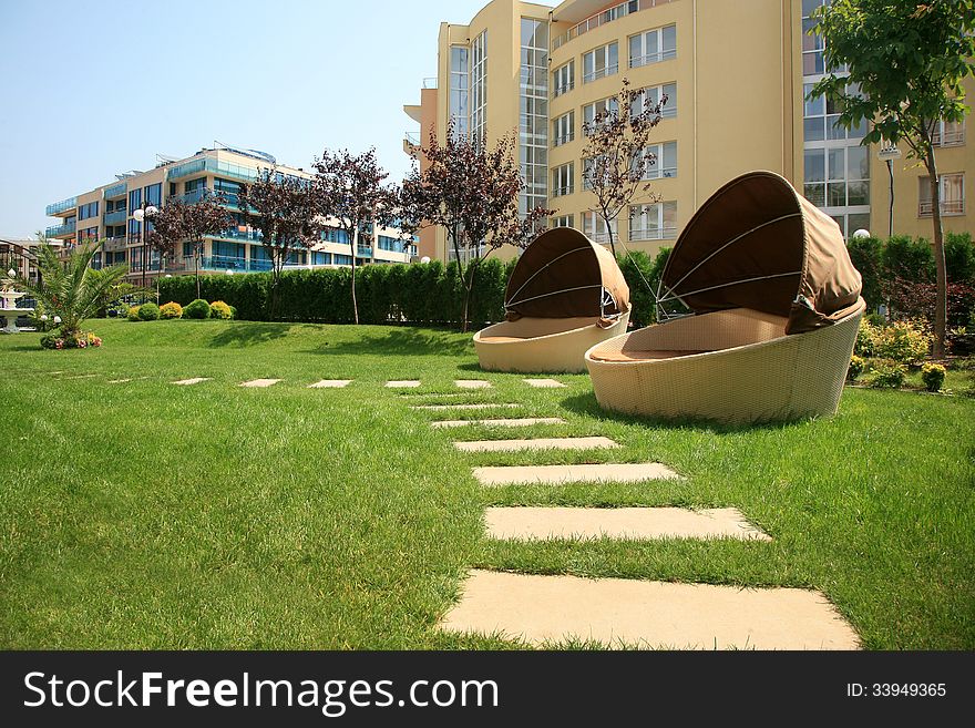 Lounge sofas in holiday resort garden