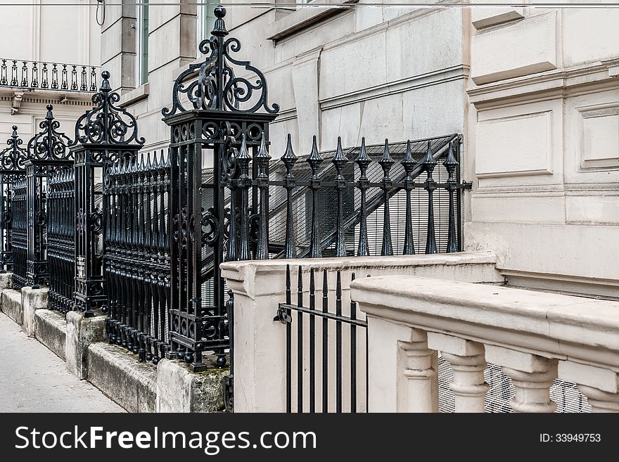 Victorian street black metal fence