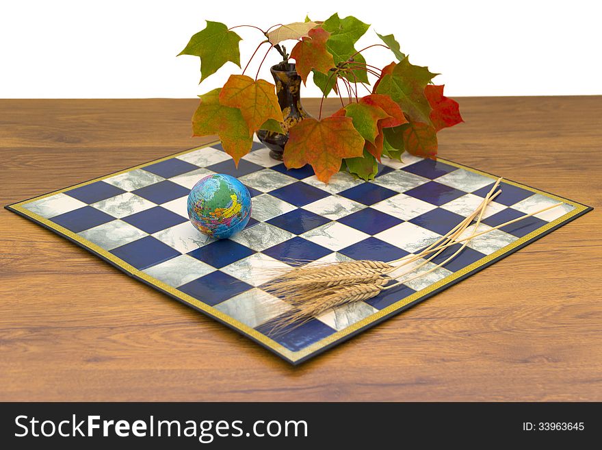 Autumn maple leaves vase chessboard sculpture girls sitting in meditation ears of wheat time blue red green white insulated von still life. Autumn maple leaves vase chessboard sculpture girls sitting in meditation ears of wheat time blue red green white insulated von still life