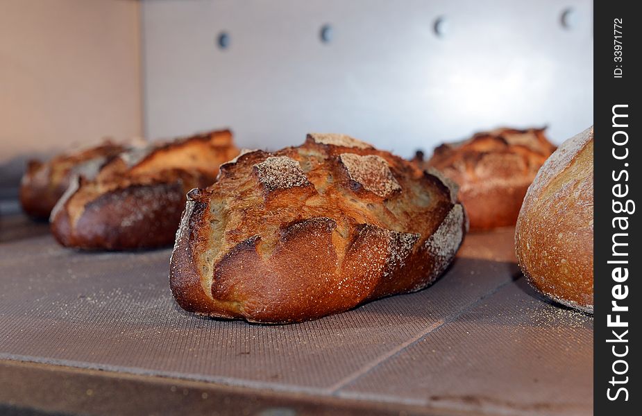 Loaf of bread is baked in the oven. Loaf of bread is baked in the oven