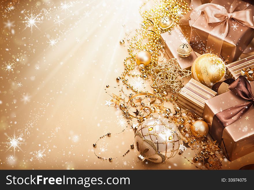 Holiday gifts and decorations on the magical background. Holiday gifts and decorations on the magical background