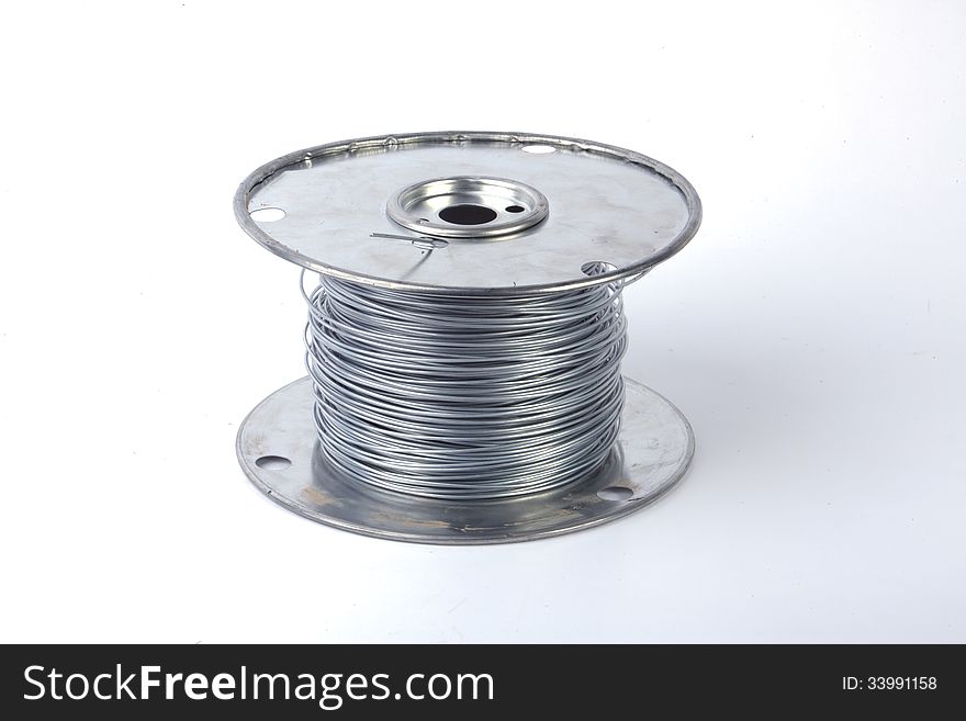 A roll of wire, isolated.