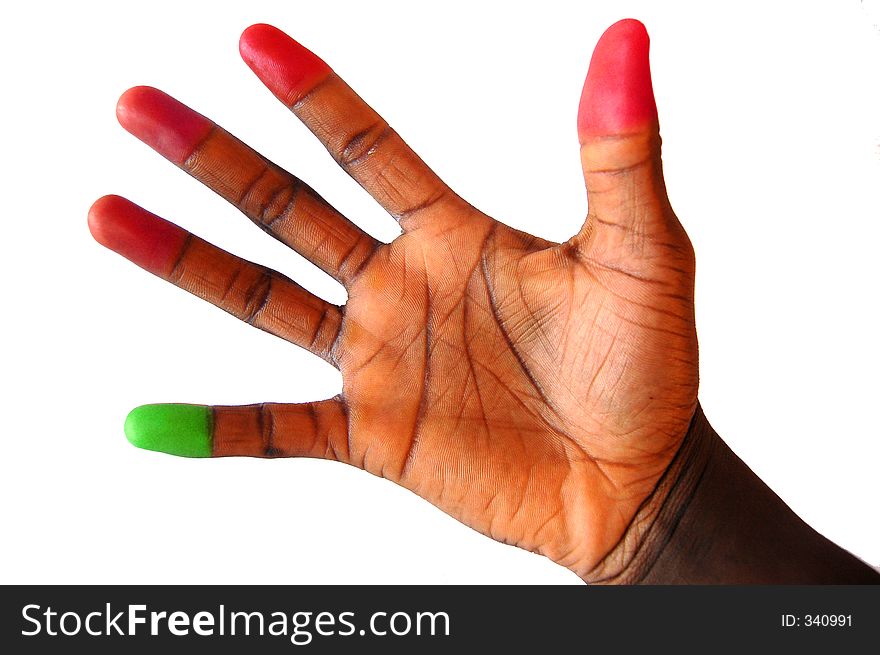 This is an image of a black hand with a green and red finger tips. This is an image of a black hand with a green and red finger tips.