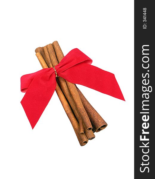 Red bow and cinnamon sticks. Red bow and cinnamon sticks