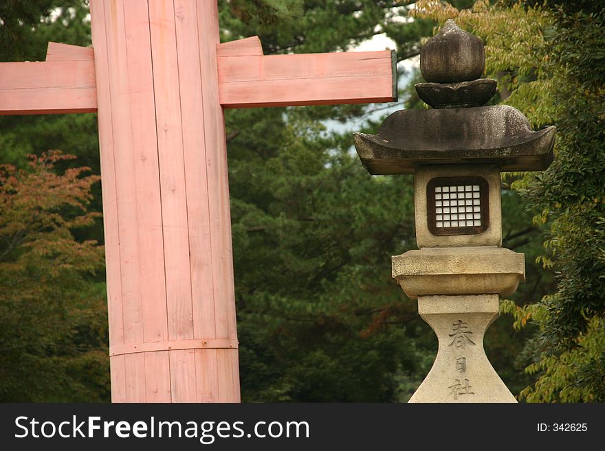 Details of a pillar and a lantern in a japanese garden. Details of a pillar and a lantern in a japanese garden