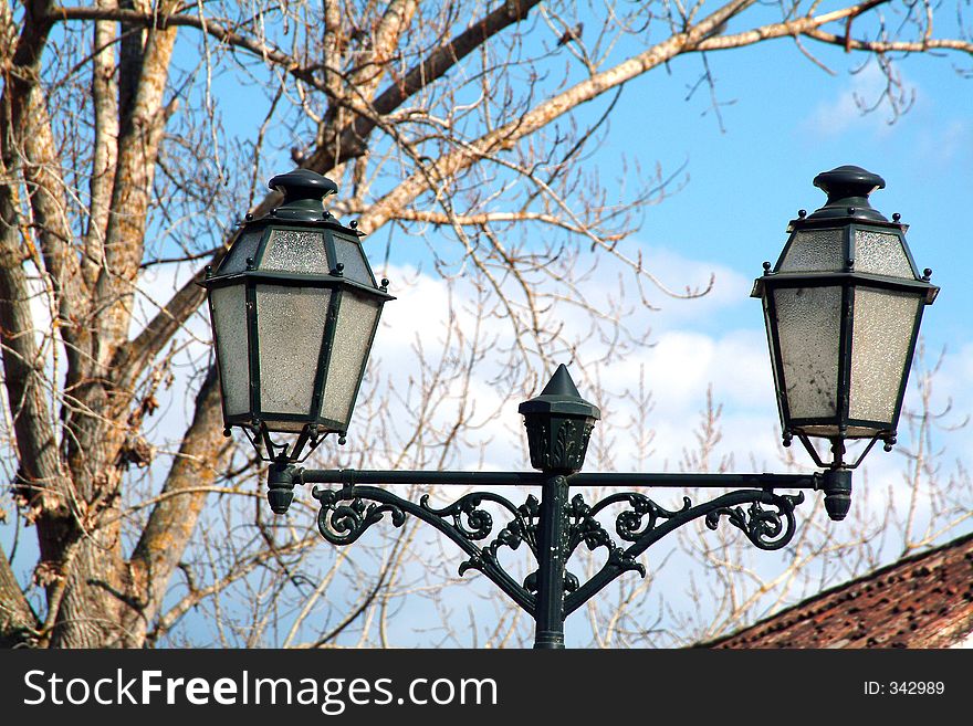 Typical street lamp and tree