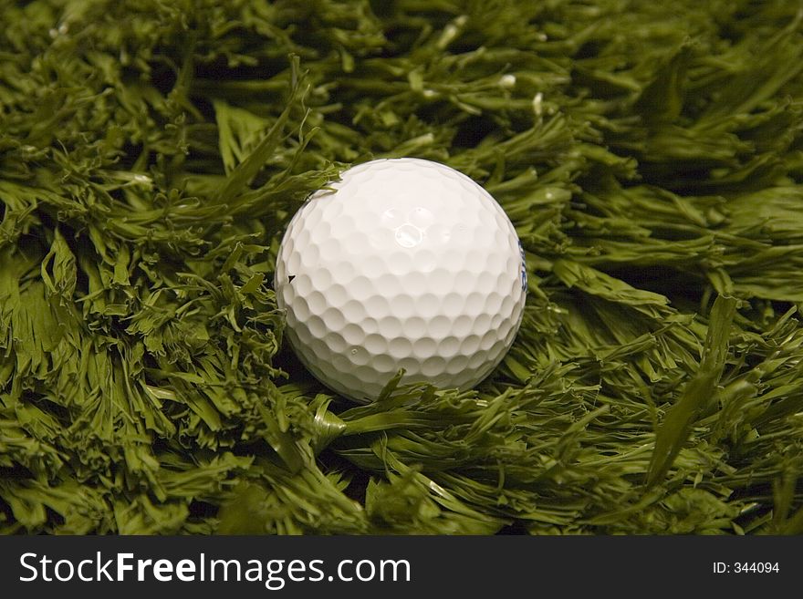 Golf ball on artificial turf