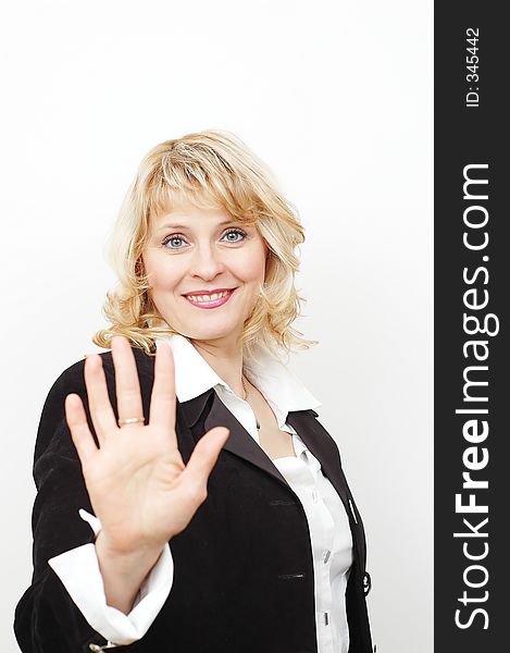 Businesswoman standing and showing her right hand. Businesswoman standing and showing her right hand.