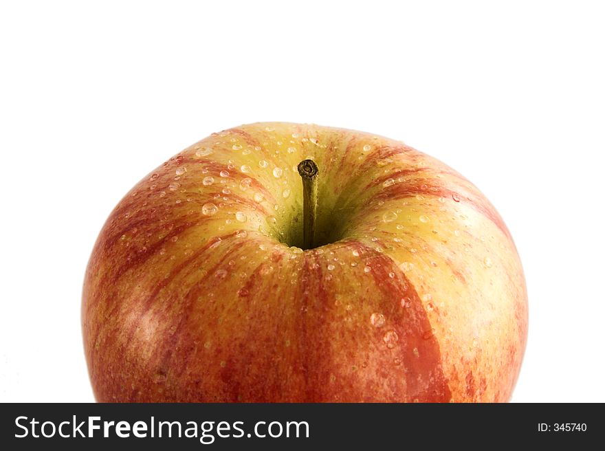 Isolated wet apple over white background