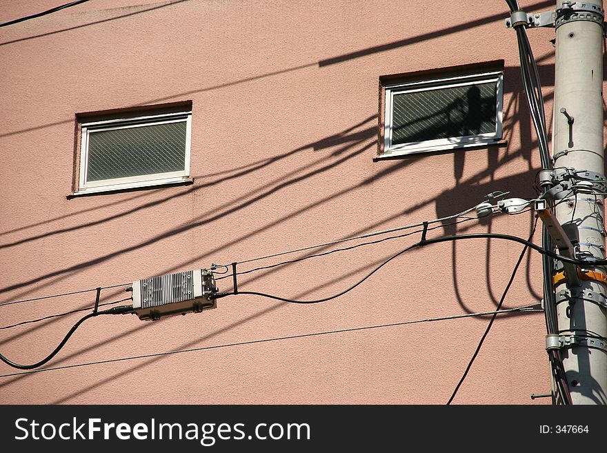 Urban scene with wires and two windows. Urban scene with wires and two windows