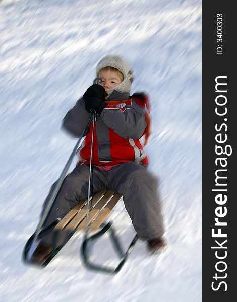 Winter time - Boy with sled