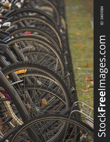 Bicycles parked in front of the central station in Delft - detail. Bicycles parked in front of the central station in Delft - detail