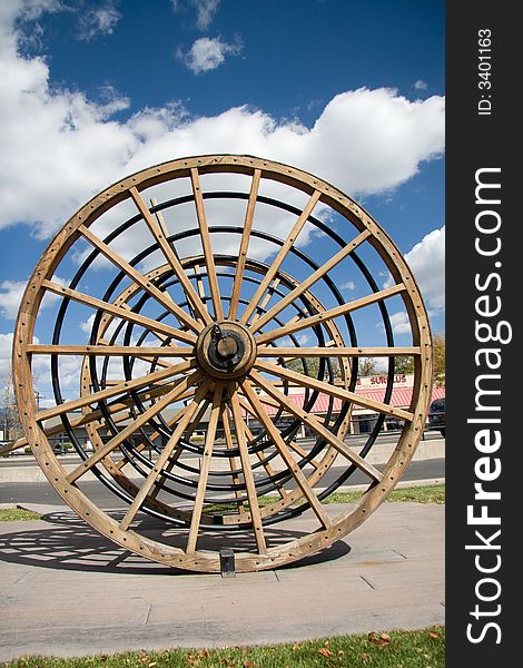 A restored wagon wheel which reminds Flagstaff visitors of how the area was first settled. A restored wagon wheel which reminds Flagstaff visitors of how the area was first settled.