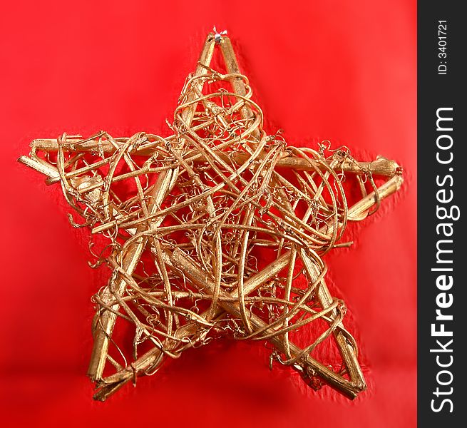 Beautiful christmas decoration as an asterisk on a red background.
