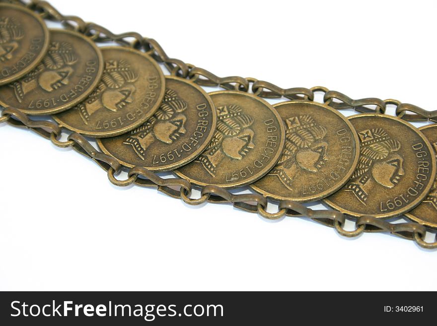 Beautiful coins belt isolated on the white.