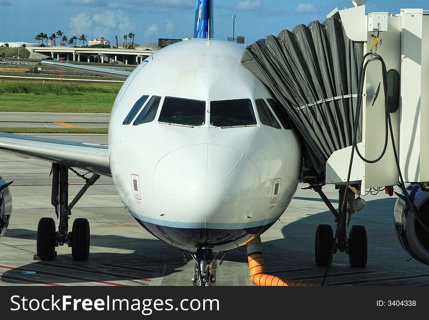 Airliner parked ready for boarding. Airliner parked ready for boarding