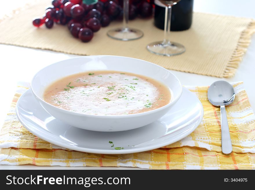 Cream of pumpkin soup with a swirl of whipped cream and sprinkle of Chinese parsley. Cream of pumpkin soup with a swirl of whipped cream and sprinkle of Chinese parsley