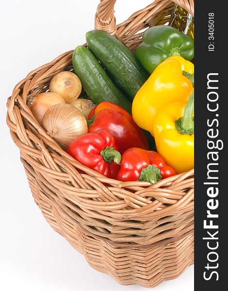 Basket with fresh peppers, onions, cucumbers. Basket with fresh peppers, onions, cucumbers