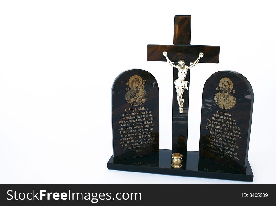 Cross with Jesus and prayers isolated on the white.