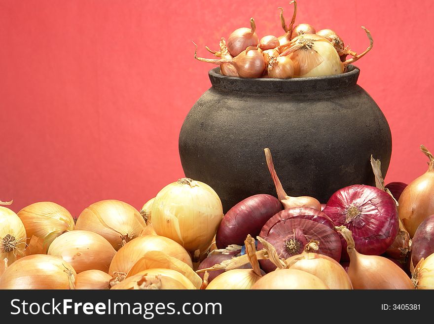 Onions on a red background