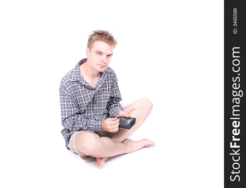 Young man with palmtop on the white background. Young man with palmtop on the white background