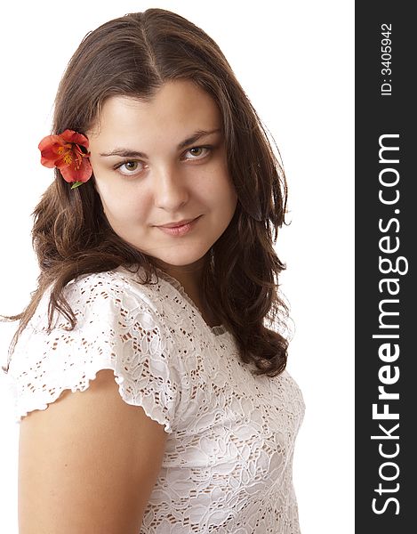 Portrait of a young woman isolated on white with flower