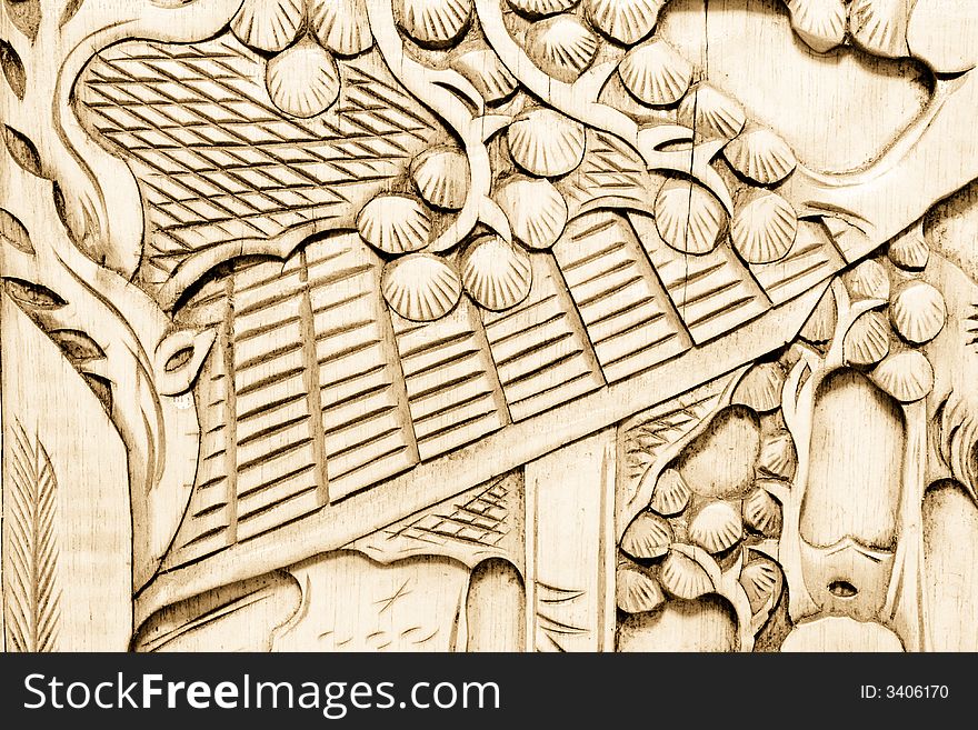 Antique high detail wood background with symbolic carvings. Antique high detail wood background with symbolic carvings.