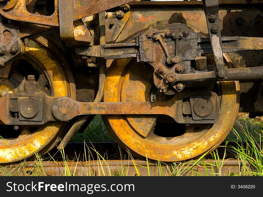 Old steam train wheels close up. Old steam train wheels close up