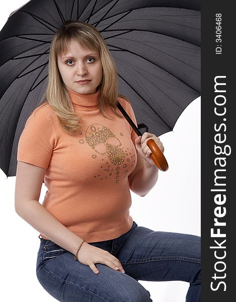 Woman sitting with black umbrella isolated on white