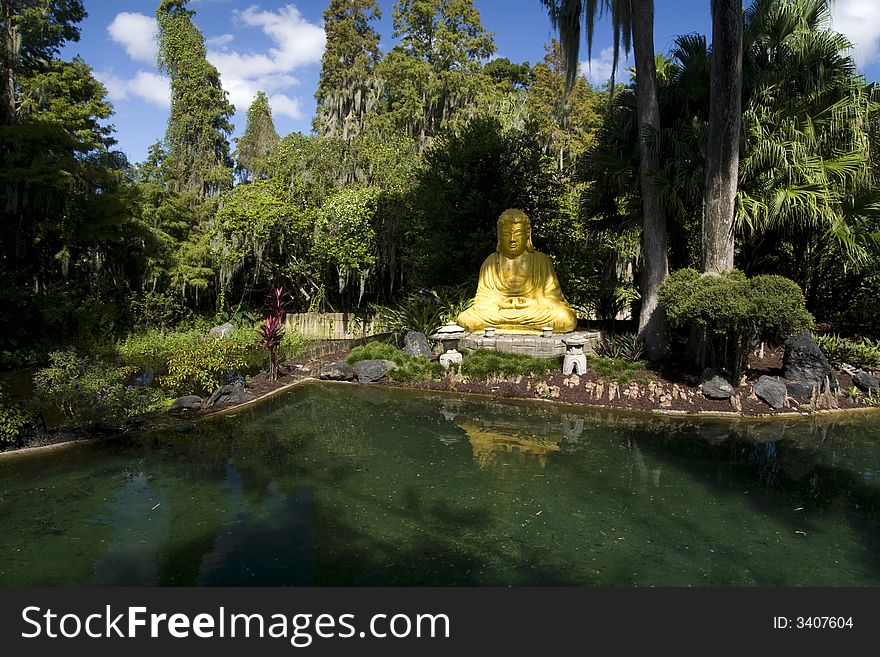 Yellow Buddha in the lake