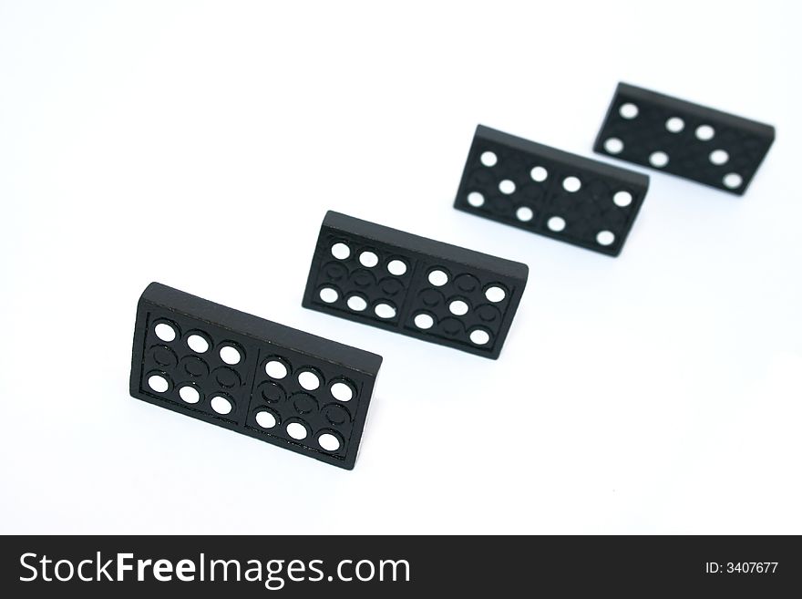 Row of dominoes isolated on the white.