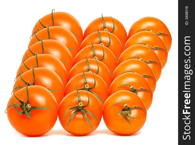 Red round tomato array on white background. Red round tomato array on white background.