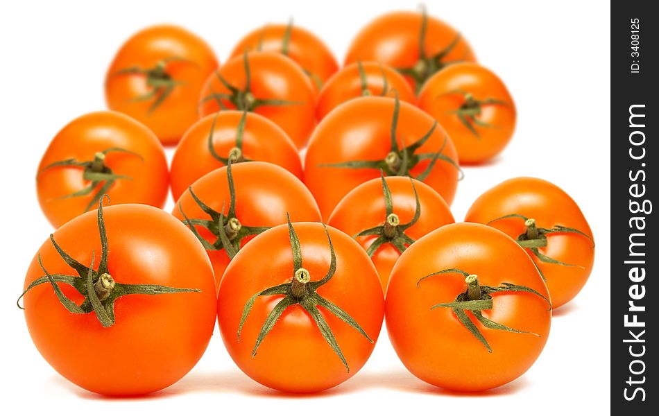 Pile of  red round tomatoes on white background. Pile of  red round tomatoes on white background