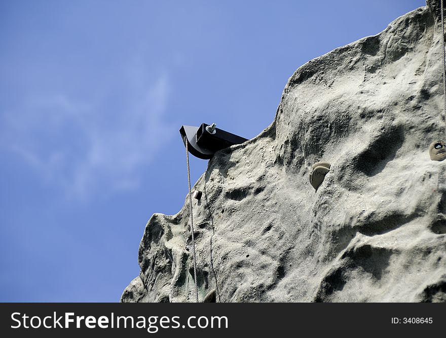 Photo of a Rock Wall With a Hoist - Background