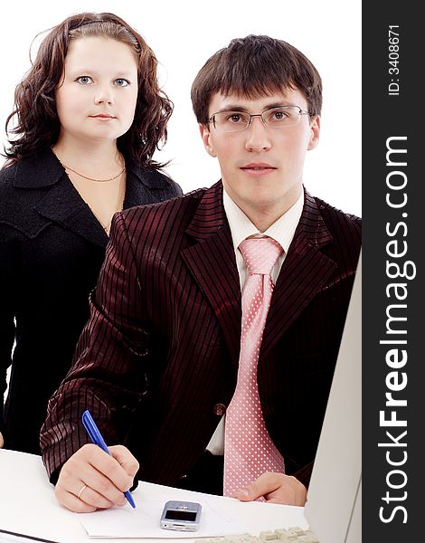 Group of business people working together. Shot in studio. Group of business people working together. Shot in studio.