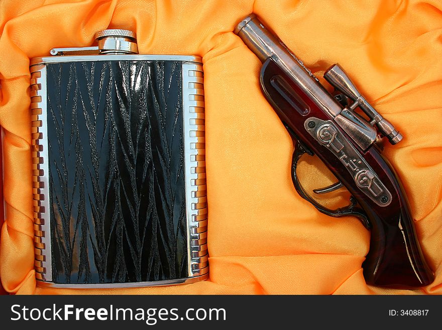 Lighting pistol and flask as a nice present set for men.