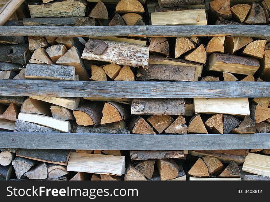 Natural background (texture) from old homemade firewood. Natural background (texture) from old homemade firewood