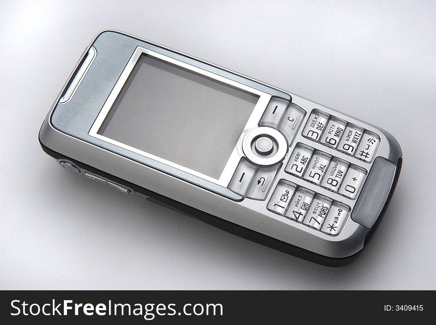 Mobile phone on a grey background