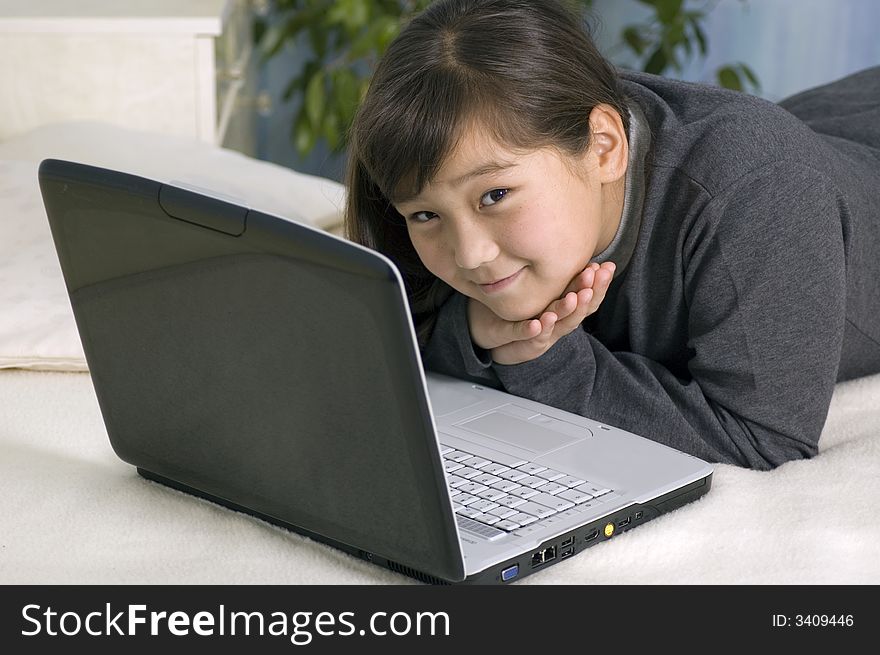 Smiling girl teenager with notebook. Smiling girl teenager with notebook.