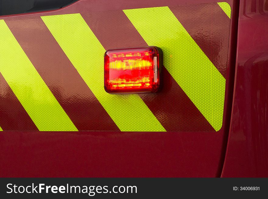 Emergency lit lamp detail from a modern firemen truck. Emergency lit lamp detail from a modern firemen truck