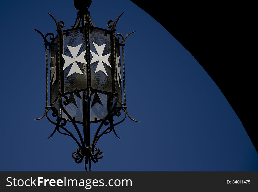 Metal Lantern with White Maltese cross. Metal Lantern with White Maltese cross.