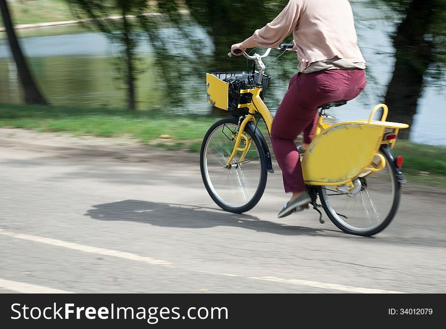 Biking in the park as a recreational activity. Biking in the park as a recreational activity